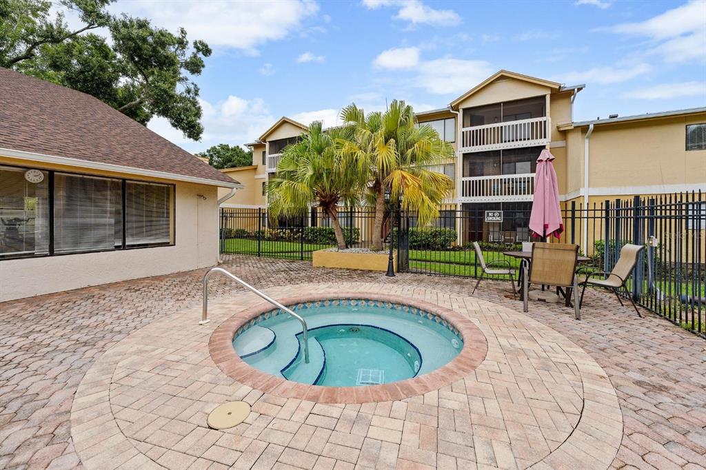 1550 South Belcher Road, Unit 223 Clearwater, FL 33764 - Photo 30 of 38 a view of a house with backyard and sitting area
