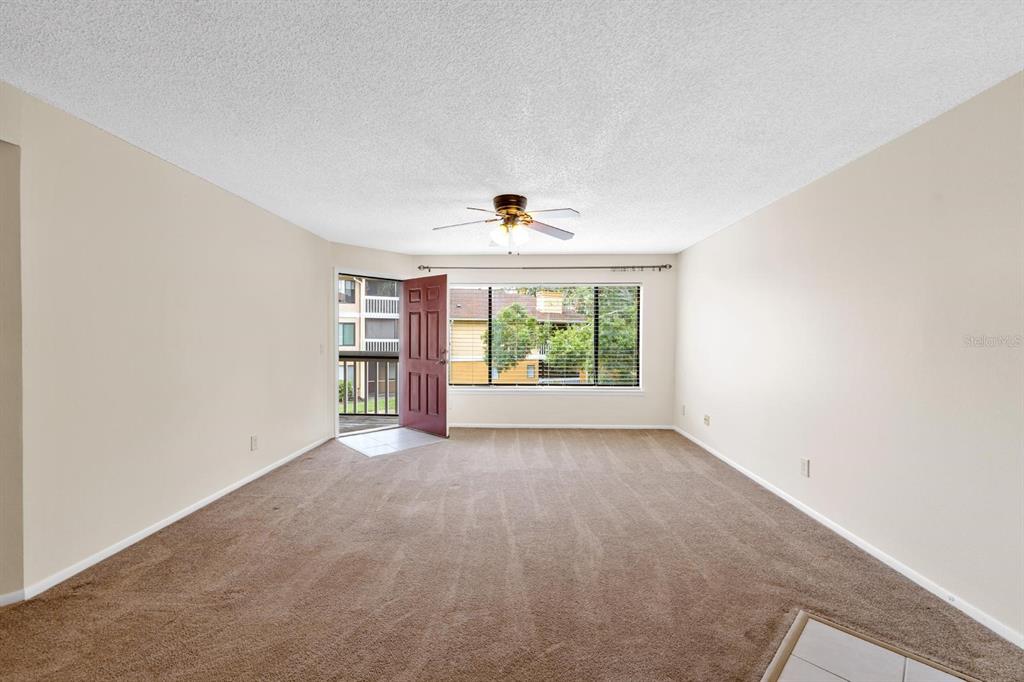 1550 South Belcher Road, Unit 223 Clearwater, FL 33764 - Photo 5 of 38 an empty room with windows