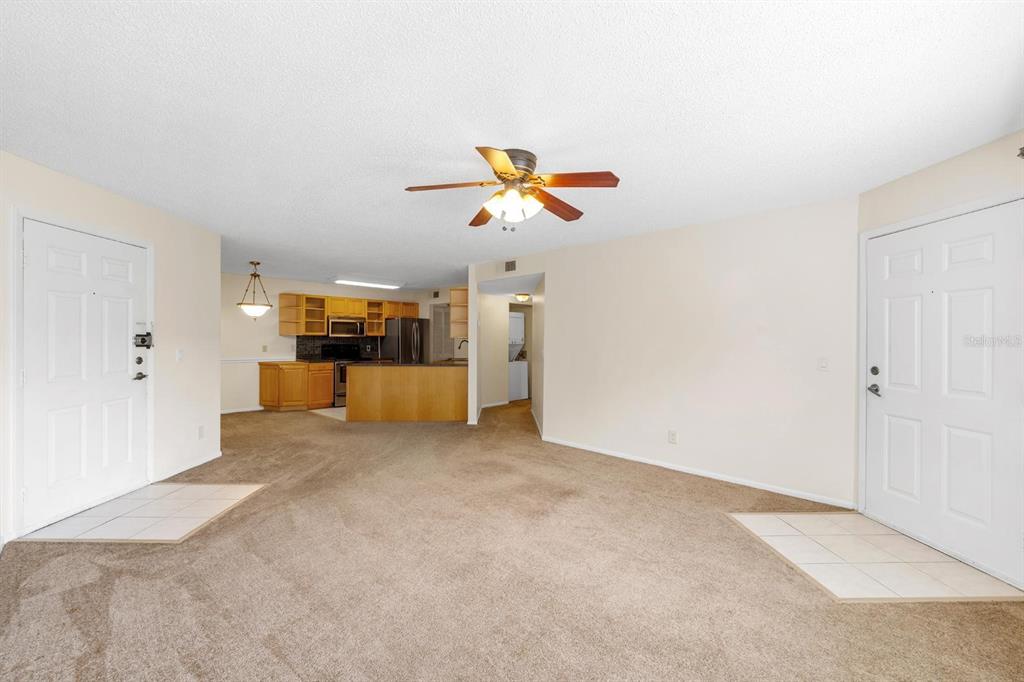 1550 South Belcher Road, Unit 223 Clearwater, FL 33764 - Photo 6 of 38 an empty room with a ceiling fan and window