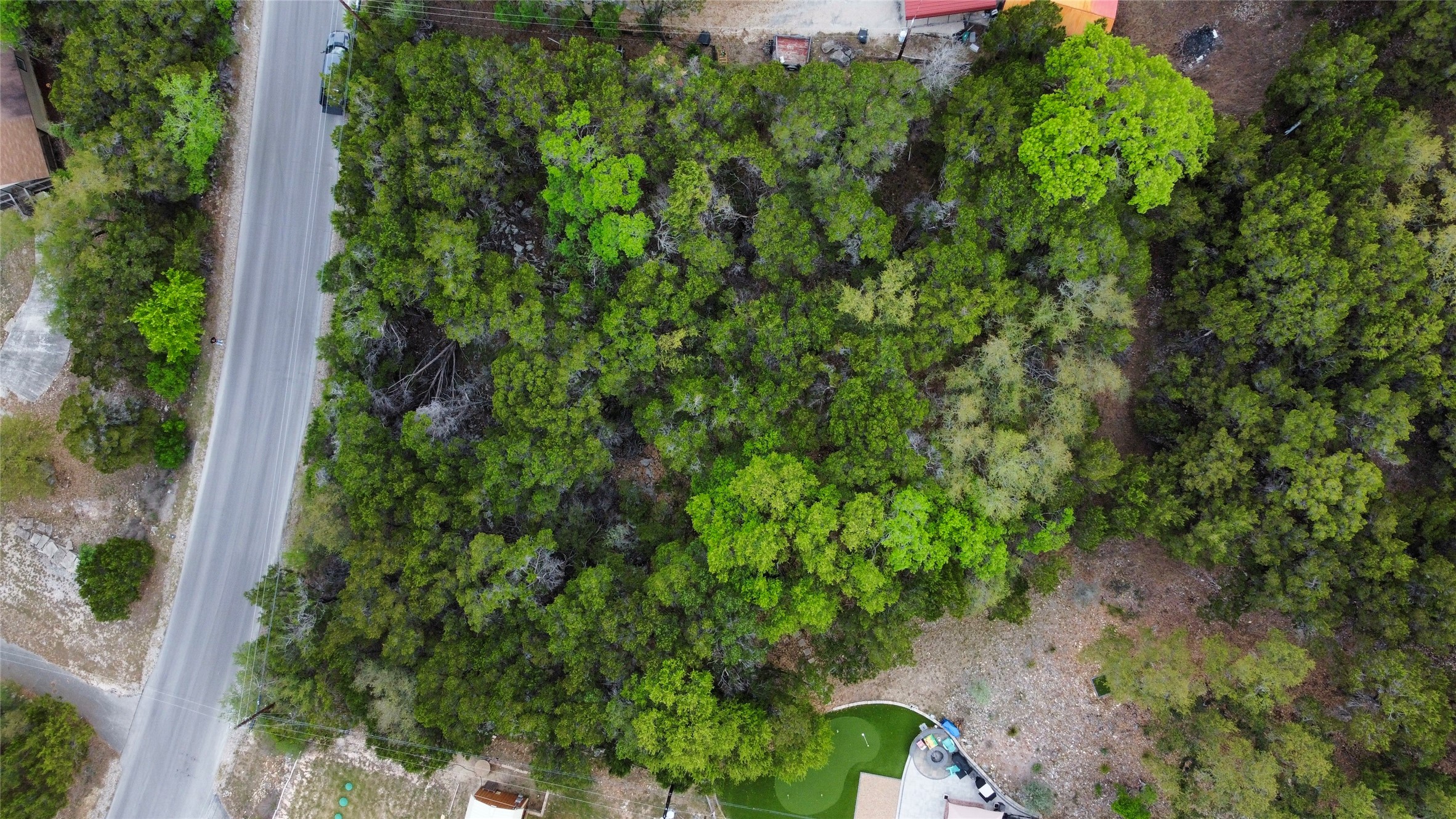 0 Rousey Street Canyon Lake, TX 78133 - Photo 5 of 7 an aerial view of a house with a yard
