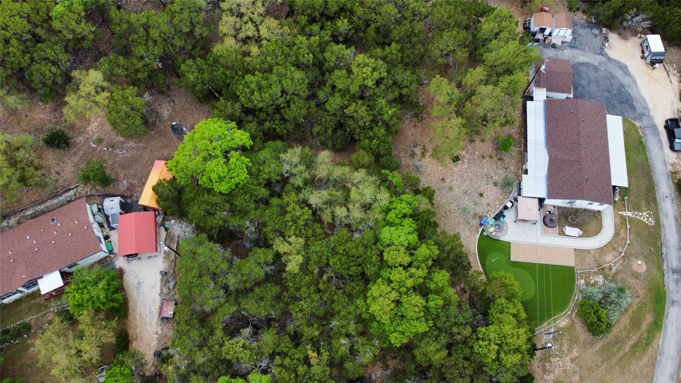 0 Rousey Street Canyon Lake, TX 78133 - Photo 7 of 7 an aerial view of a house with outdoor space
