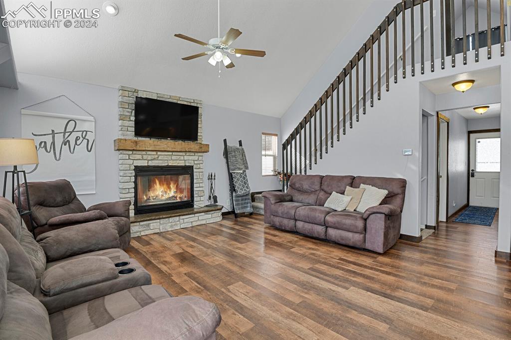998 Bunker Hill Road Silver Cliff, CO 81252 - Photo 22 of 49 a living room with furniture and a fireplace