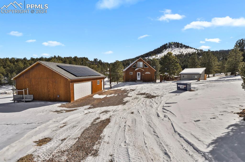 998 Bunker Hill Road Silver Cliff, CO 81252 - Photo 42 of 49 a view of a house with a yard