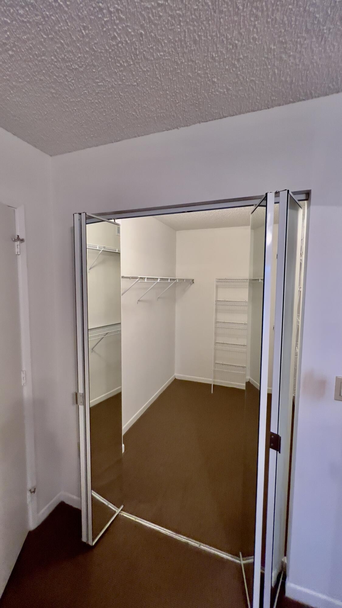 6121 Pointe Regal Circle, Unit 209 Delray Beach, FL 33484 - Photo 15 of 41 a view of an empty room