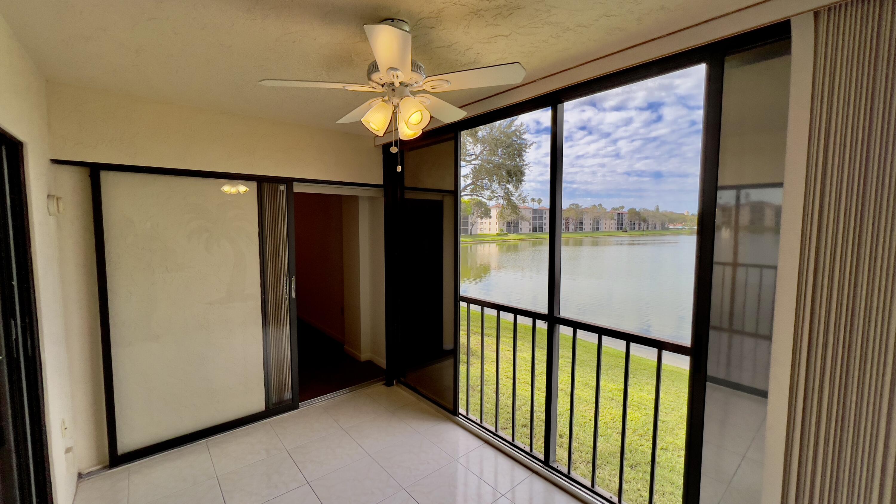 6121 Pointe Regal Circle, Unit 209 Delray Beach, FL 33484 - Photo 18 of 41 a view of a hallway