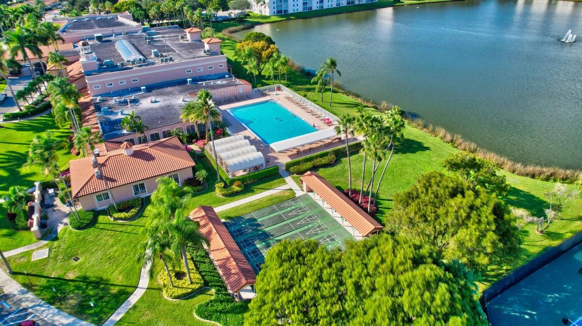 6121 Pointe Regal Circle, Unit 209 Delray Beach, FL 33484 - Photo 30 of 41 an aerial view of a house with a lake view
