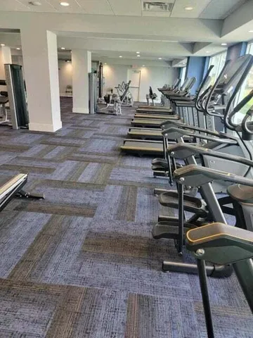 a view of a room with gym equipment