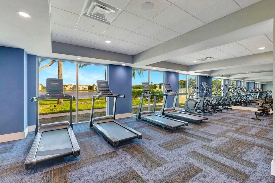 6121 Pointe Regal Circle, Unit 209 Delray Beach, FL 33484 - Photo 34 of 41 a view of a room with gym equipment