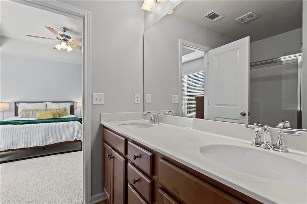 63 Creighton Lane Marietta, GA 30008 - Photo 15 of 23 a bathroom with a sink and a mirror