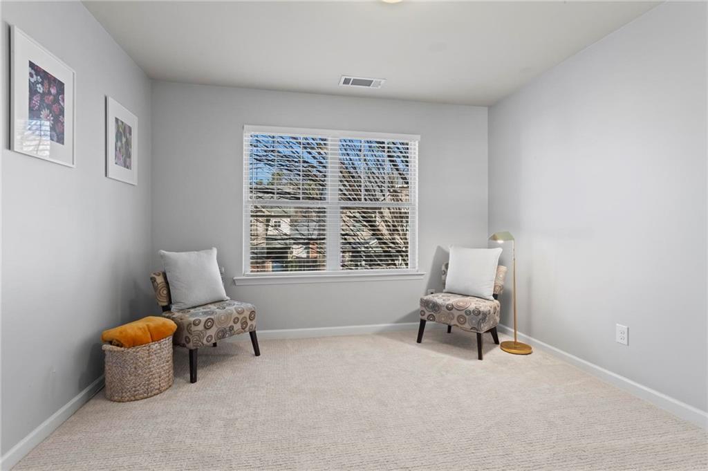 63 Creighton Lane Marietta, GA 30008 - Photo 18 of 23 a living room with furniture and a window