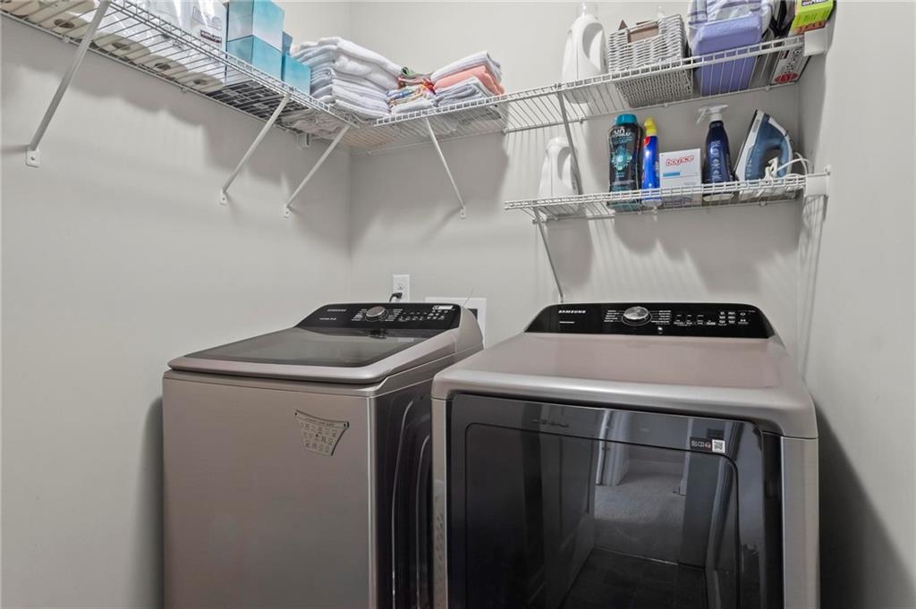 63 Creighton Lane Marietta, GA 30008 - Photo 21 of 23 a utility room with dryer and washer