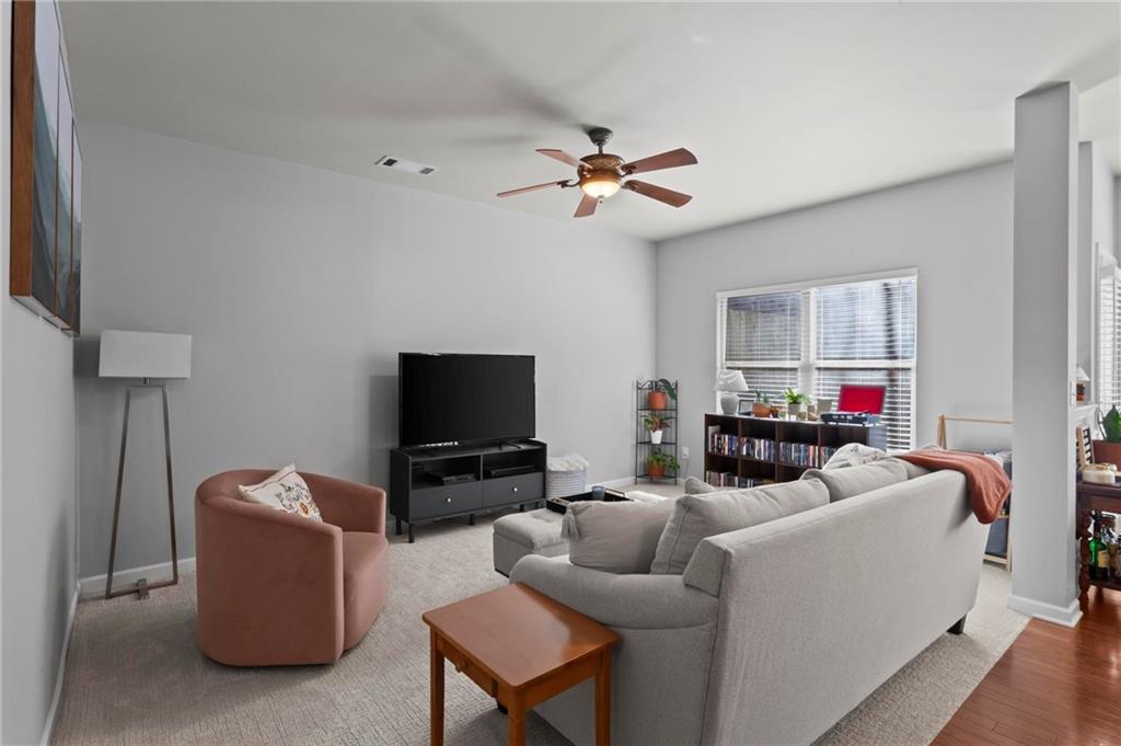 63 Creighton Lane Marietta, GA 30008 - Photo 3 of 23 a living room with furniture and a flat screen tv