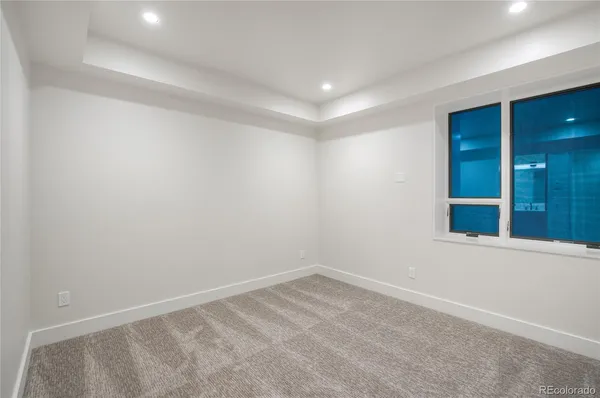 an empty room with a natural light