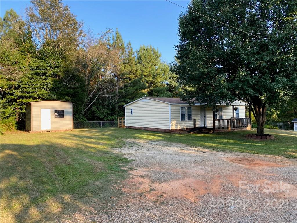 675 Hendricks Road Salisbury, NC 28147 - Photo 13 of 17 a house with trees in front of it