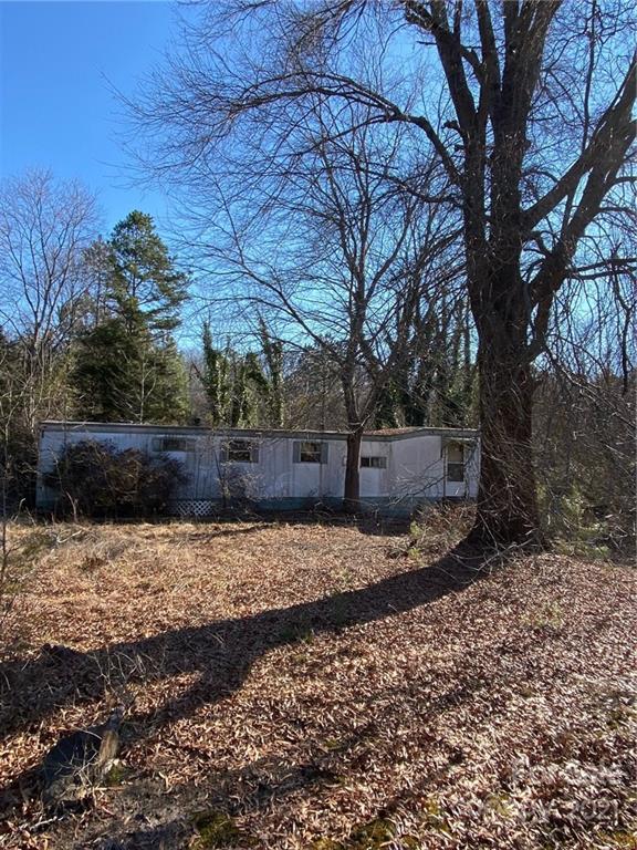675 Hendricks Road Salisbury, NC 28147 - Photo 16 of 17 a view of a backyard with large trees