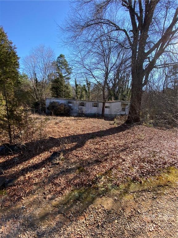 675 Hendricks Road Salisbury, NC 28147 - Photo 17 of 17 a view of a yard with trees