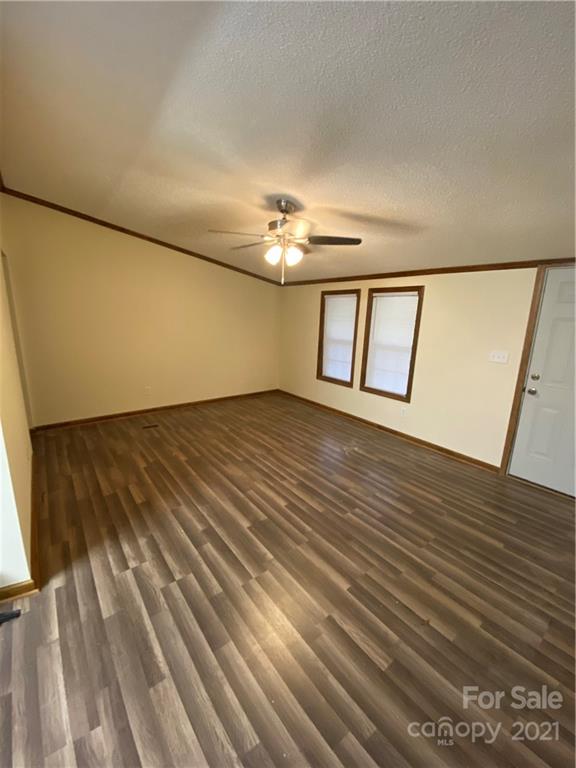 675 Hendricks Road Salisbury, NC 28147 - Photo 3 of 17 a view of wooden floor and windows in a room