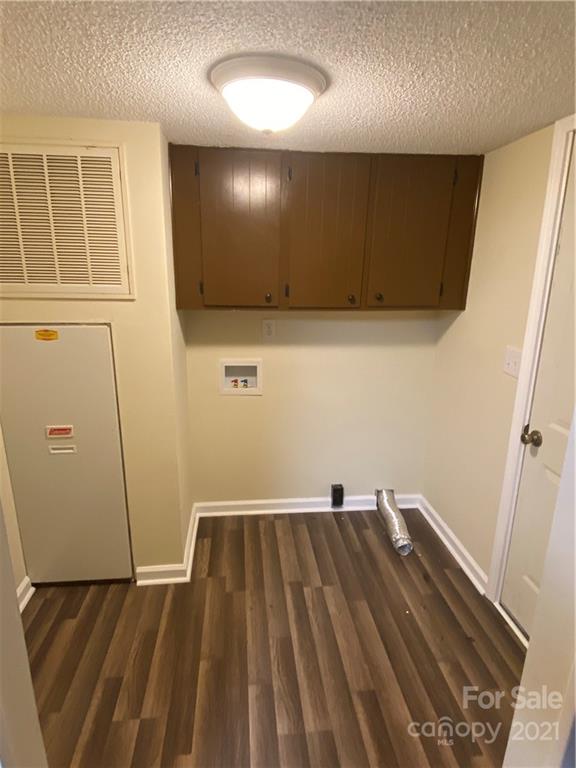 675 Hendricks Road Salisbury, NC 28147 - Photo 5 of 17 a view of an empty room with wooden floor