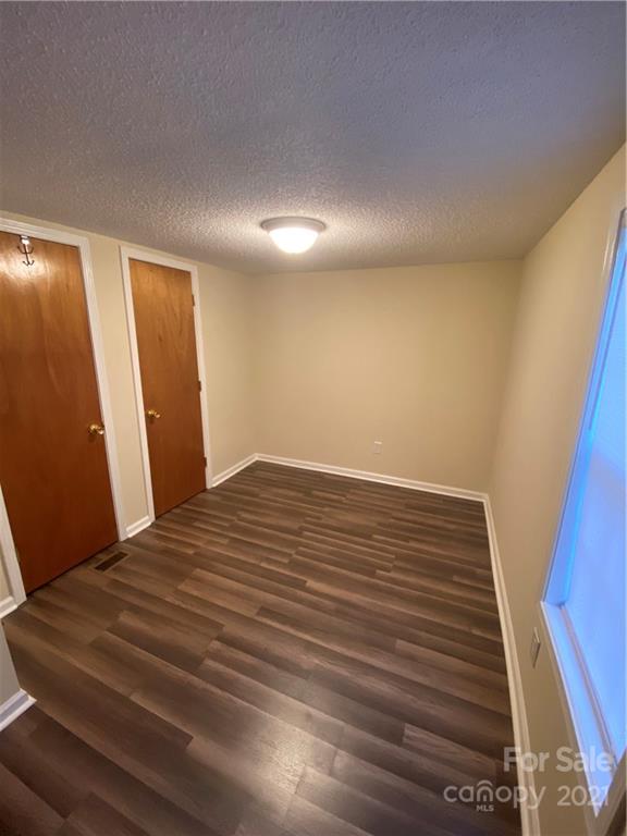 675 Hendricks Road Salisbury, NC 28147 - Photo 10 of 17 a view of empty room with wooden floor