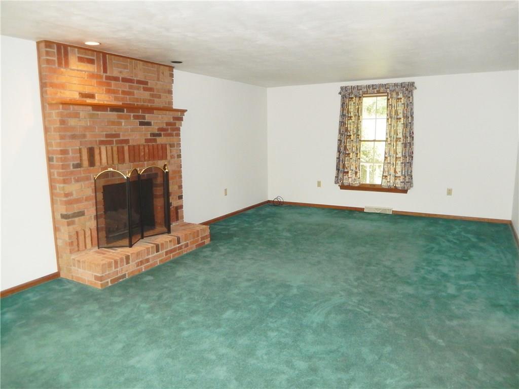 3231 Ridgeway Road Greensburg, PA 15601 - Photo 9 of 25 1st floor family room with gas fireplace. Perfect for those chilly fall and winter nights.