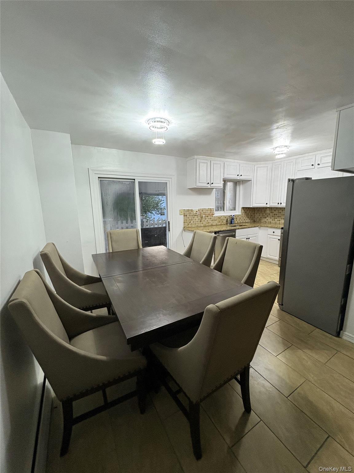 269 Balcom Avenue Bronx, NY 10465 - Photo 6 of 20 Dining space with light tile patterned flooring