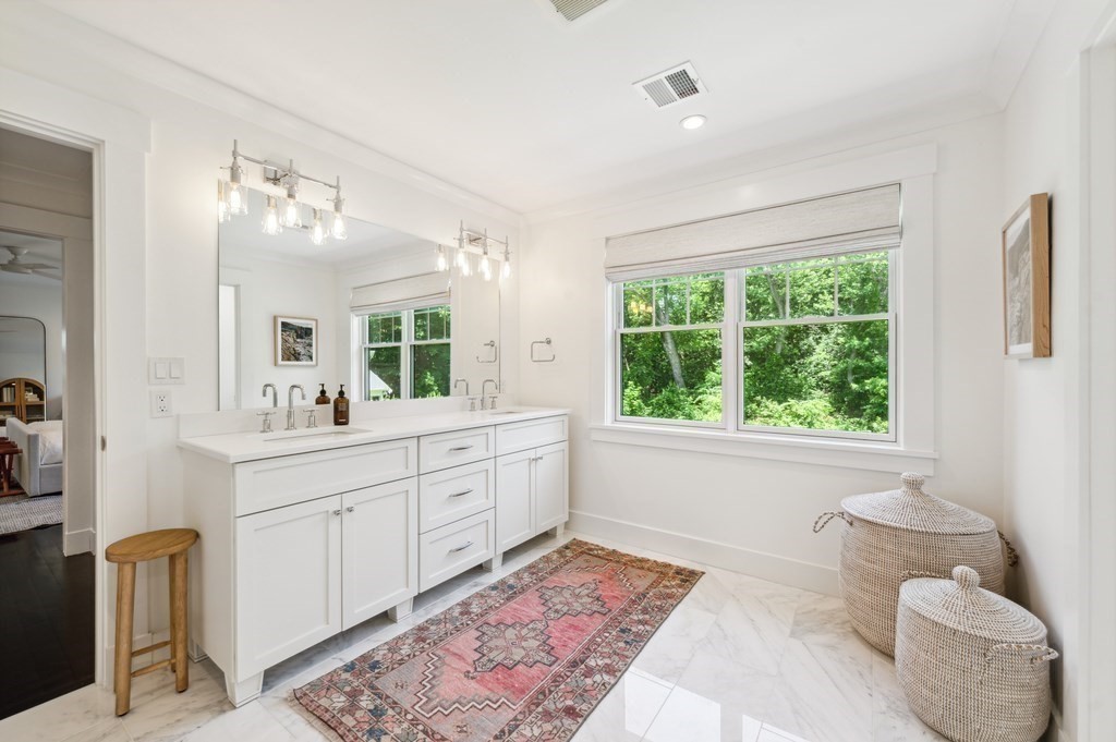 40 Carver Road Wellesley, MA 02481 - Photo 14 of 34 a spacious bathroom with a double vanity sink mirror and toilet