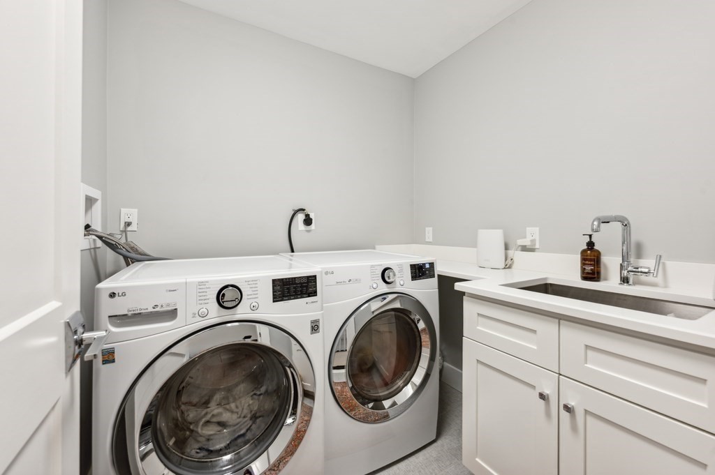 40 Carver Road Wellesley, MA 02481 - Photo 21 of 34 a utility room with dryer and washer