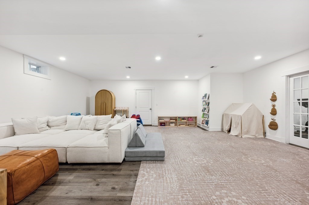 40 Carver Road Wellesley, MA 02481 - Photo 22 of 34 a living room with furniture and a large window