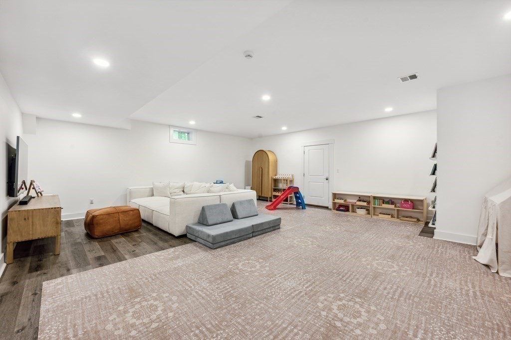 40 Carver Road Wellesley, MA 02481 - Photo 23 of 34 a bed room with bed and a couch