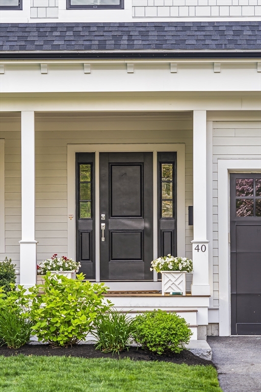 40 Carver Road Wellesley, MA 02481 - Photo 26 of 34 a front view of a house with garden