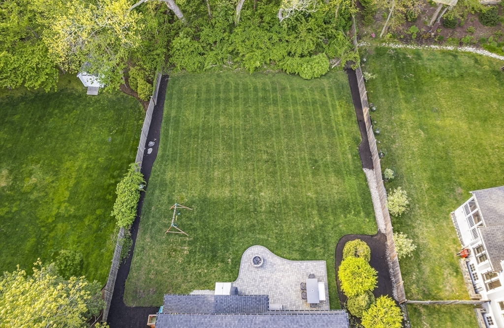 40 Carver Road Wellesley, MA 02481 - Photo 32 of 34 a view of a swimming pool with a backyard