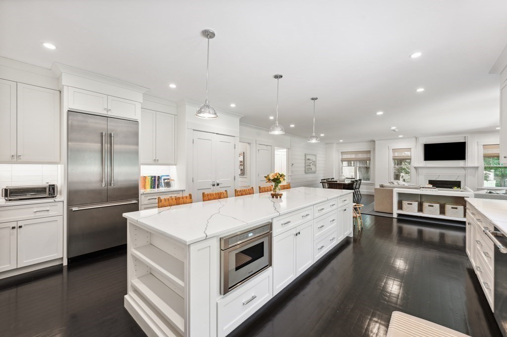 40 Carver Road Wellesley, MA 02481 - Photo 5 of 34 a large white kitchen with a stove top oven