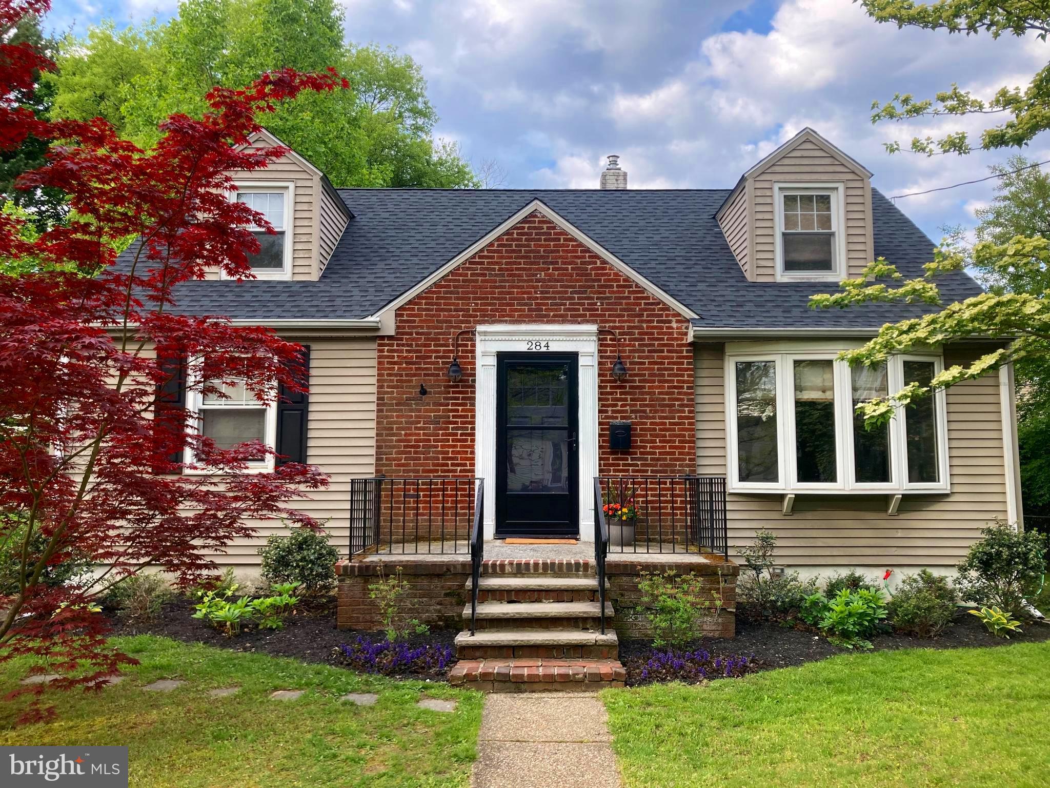 284 Bewley Road Haddonfield, NJ 08033 - Photo 2 of 36 a front view of a house with garden