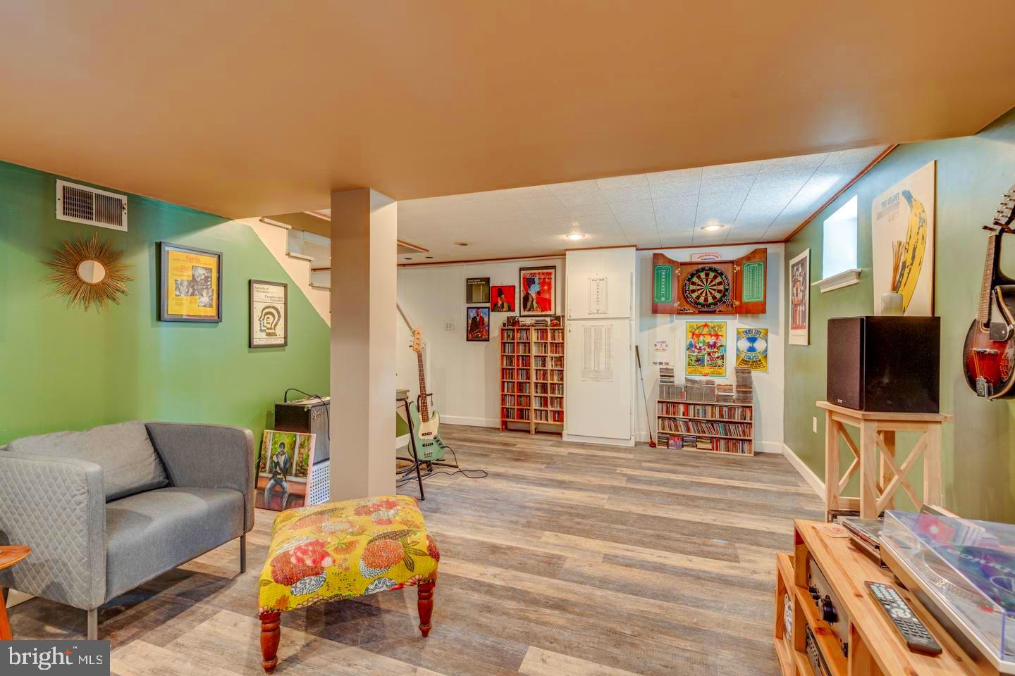 284 Bewley Road Haddonfield, NJ 08033 - Photo 29 of 36 a living room with furniture and a flat screen tv
