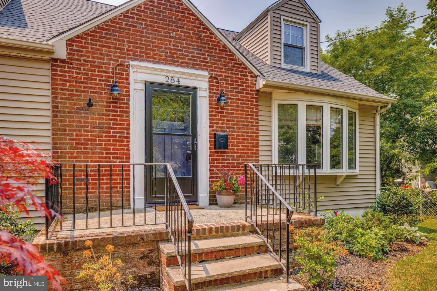 284 Bewley Road Haddonfield, NJ 08033 - Photo 5 of 36 a front view of a house with a porch