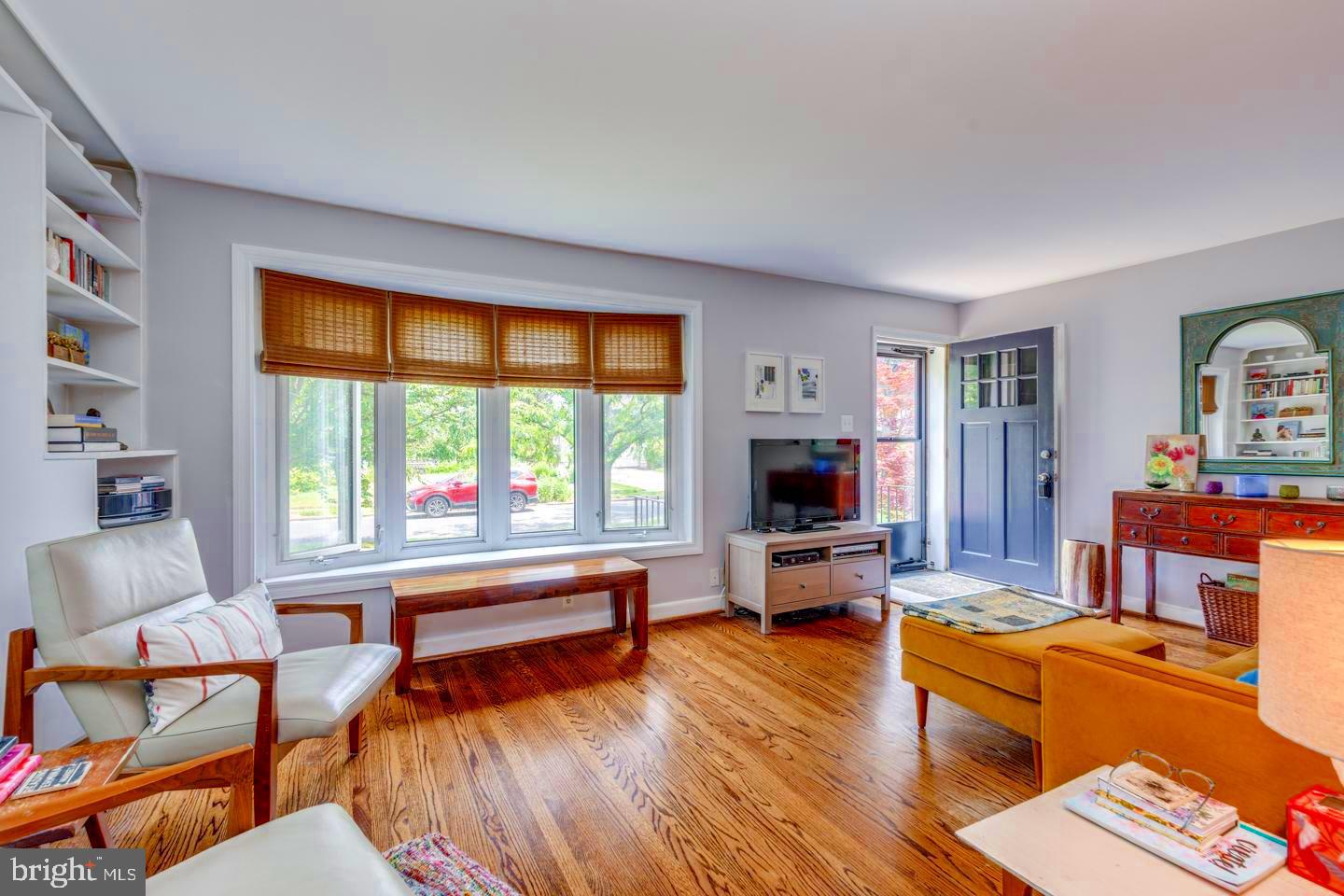 284 Bewley Road Haddonfield, NJ 08033 - Photo 8 of 36 a living room with furniture and a flat screen tv