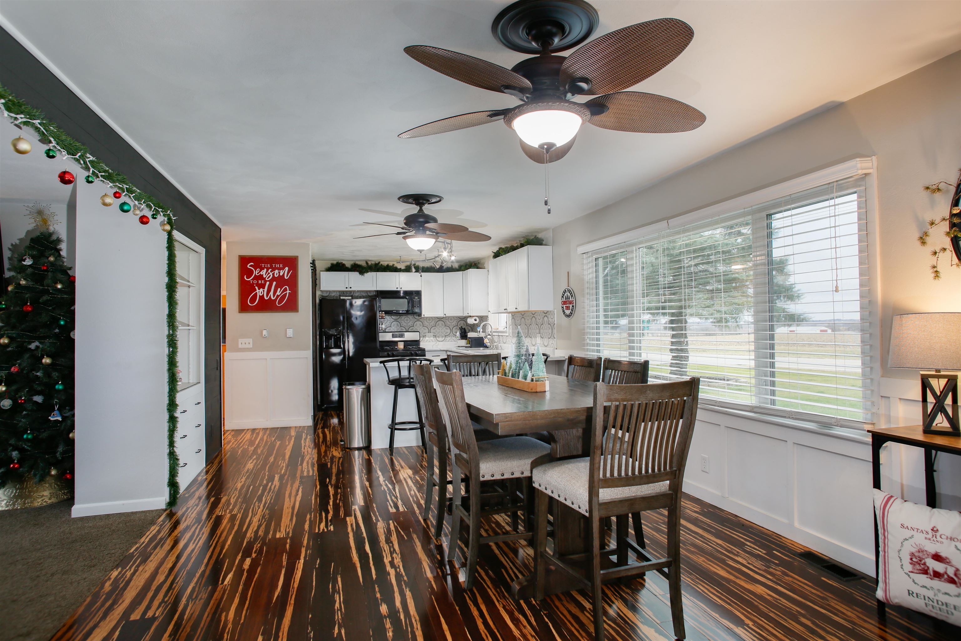 1477 Highway 75 Freeport, IL 61032 - Photo 3 of 13 a view of a dining room with furniture window and wooden floor