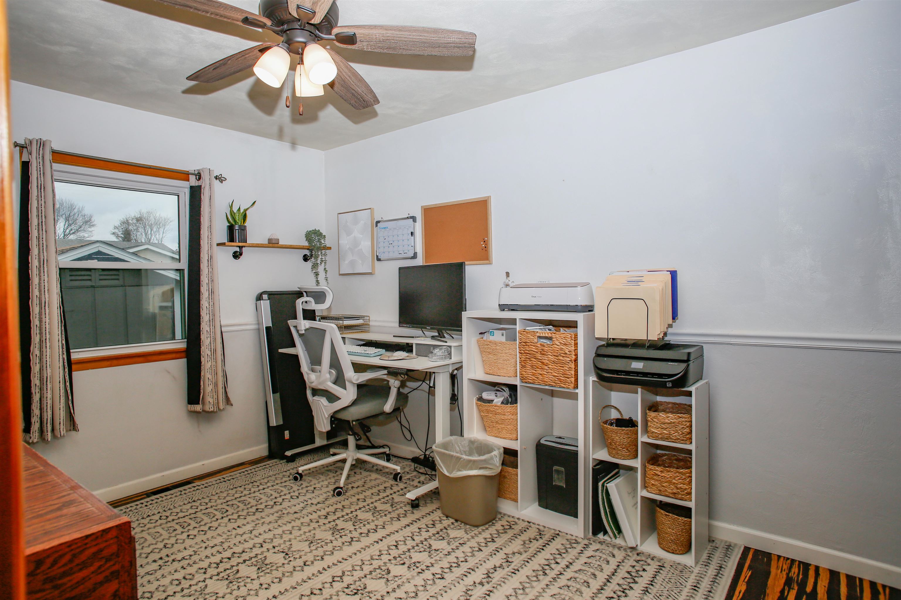 1477 Highway 75 Freeport, IL 61032 - Photo 6 of 13 a view of a workspace with furniture and a window