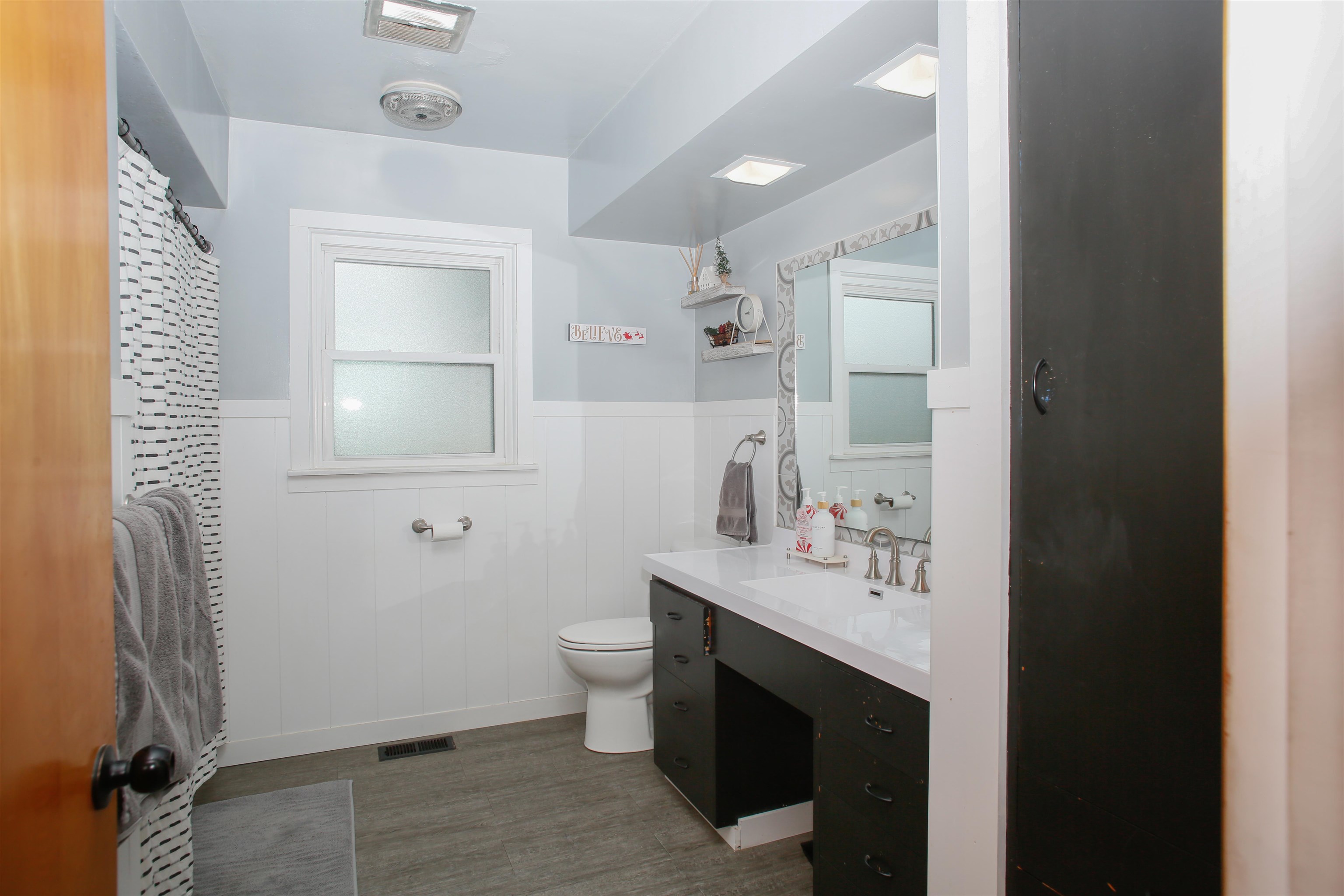1477 Highway 75 Freeport, IL 61032 - Photo 7 of 13 a bathroom with a sink toilet and mirror