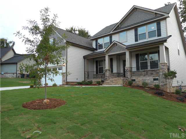 465 Waterville Street Raleigh, NC 27603 - Photo 3 of 25 Garage Door is now painted the same color as the trim.