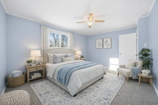 a bedroom with a bed and a chandelier