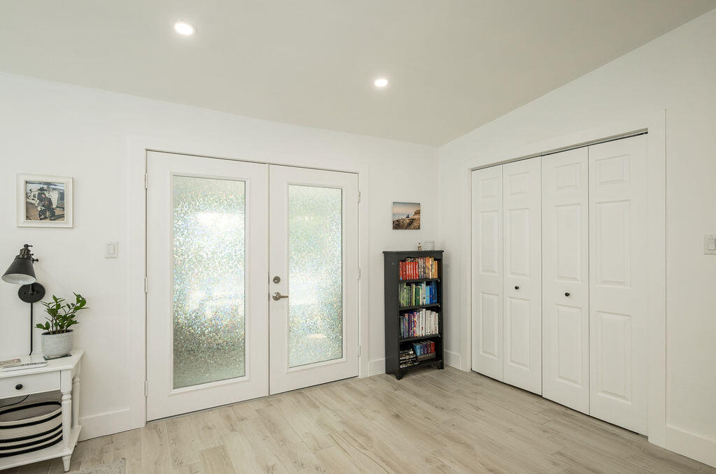 3402 Eagle Avenue Key West, FL 33040 - Photo 13 of 27 an empty room with closet and wooden floor