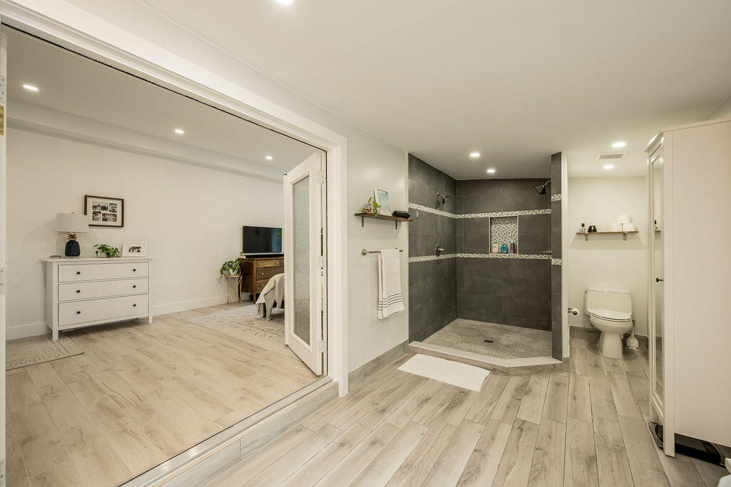 3402 Eagle Avenue Key West, FL 33040 - Photo 14 of 27 a bathroom with a sink a toilet and a shower
