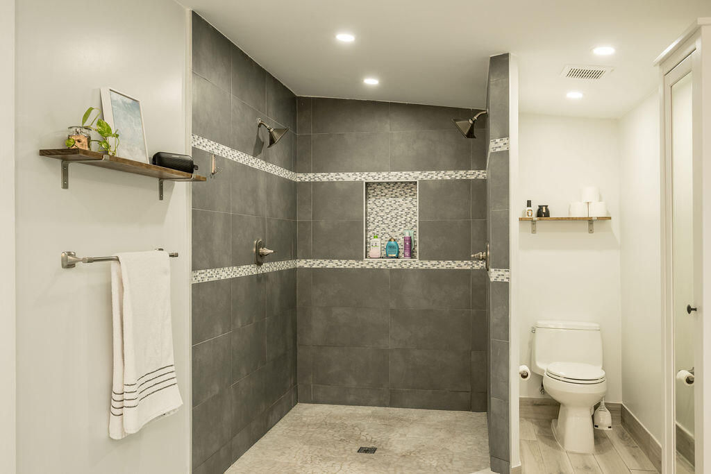 3402 Eagle Avenue Key West, FL 33040 - Photo 19 of 27 a bathroom with a shower and a toilet