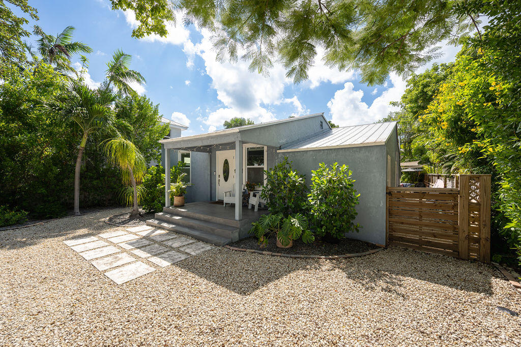 3402 Eagle Avenue Key West, FL 33040 - Photo 2 of 27 a view of a house with a yard