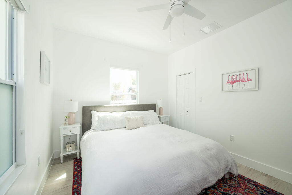 3402 Eagle Avenue Key West, FL 33040 - Photo 21 of 27 a bedroom with a bed and a painting on the wall