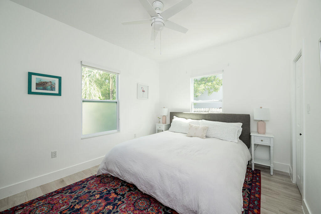 3402 Eagle Avenue Key West, FL 33040 - Photo 22 of 27 a bedroom with a bed and a window