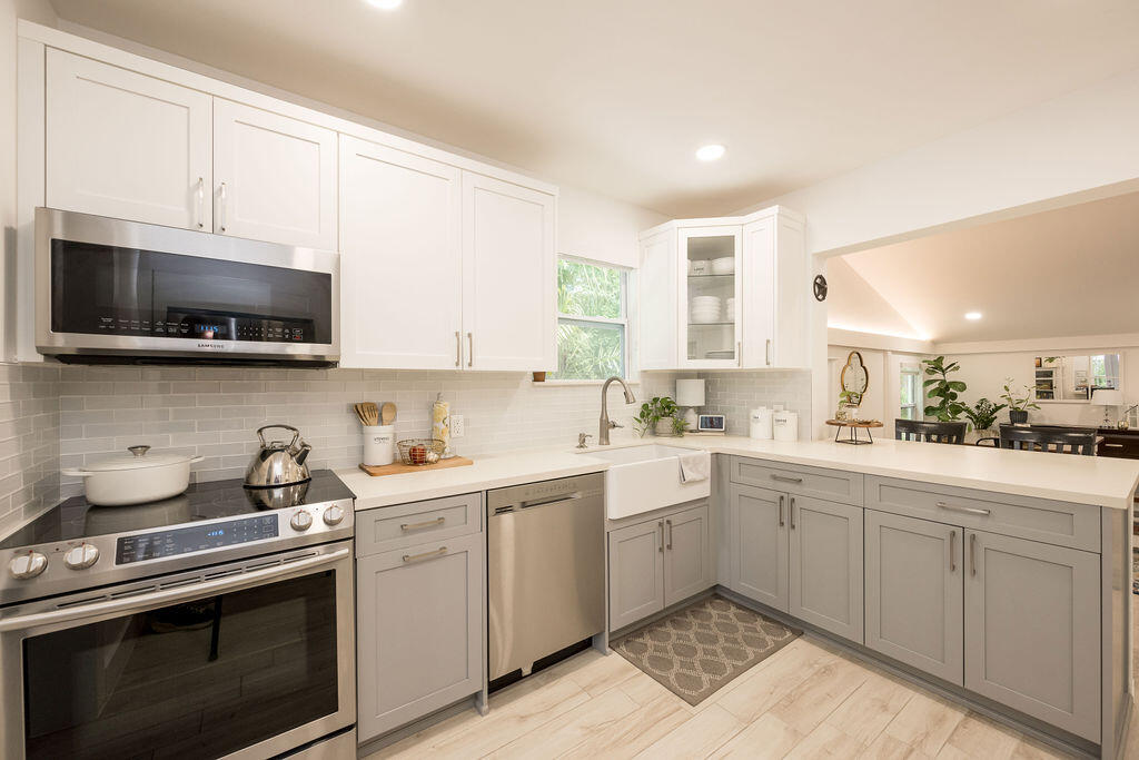 3402 Eagle Avenue Key West, FL 33040 - Photo 3 of 27 a kitchen with a sink stove and microwave