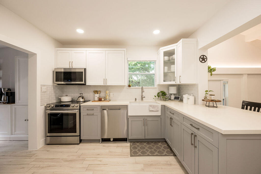 3402 Eagle Avenue Key West, FL 33040 - Photo 5 of 27 a kitchen with a sink stove and microwave