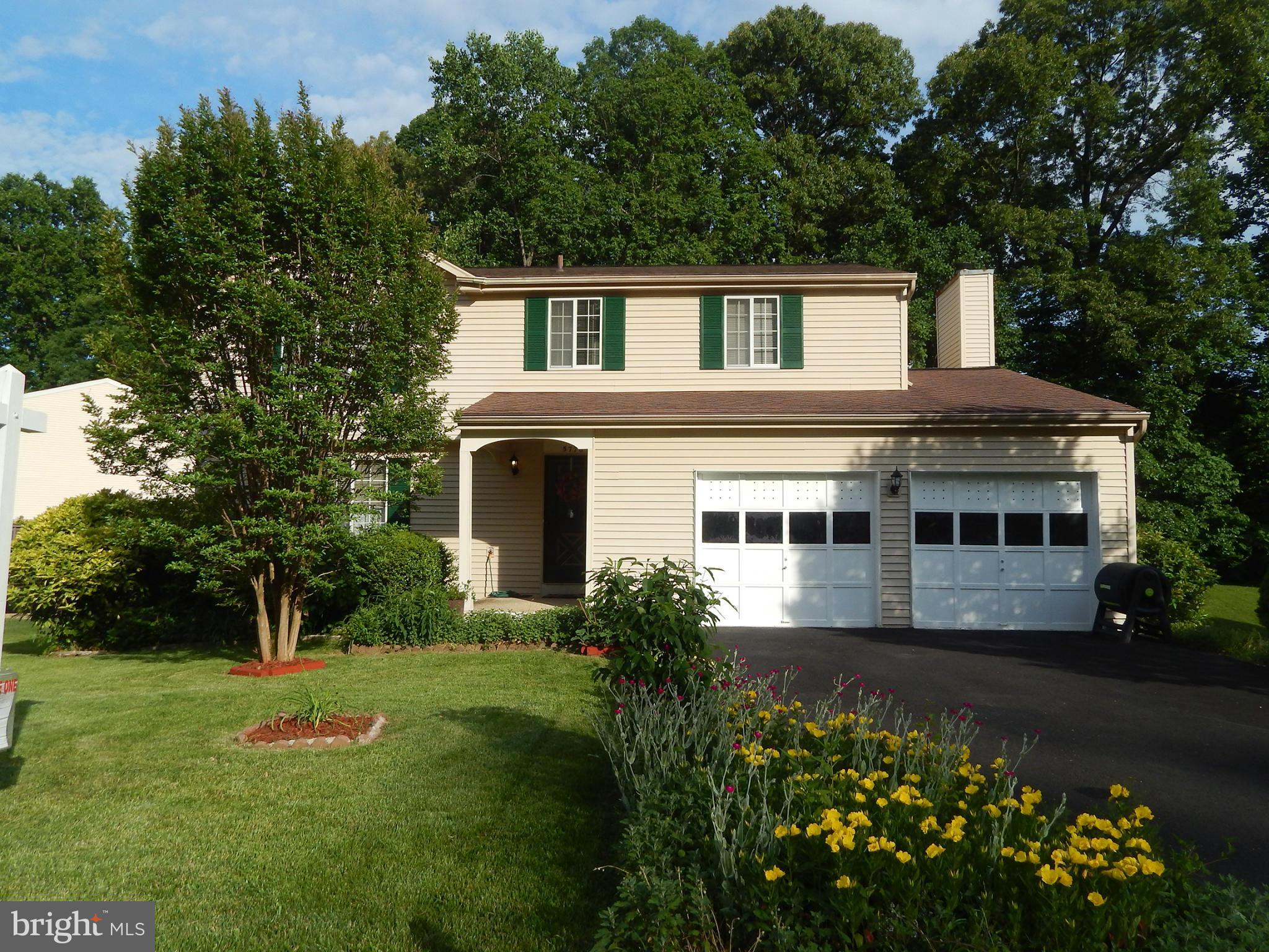 5776 Heming Avenue Springfield, VA 22151 - Photo 1 of 25 a house view with a garden space